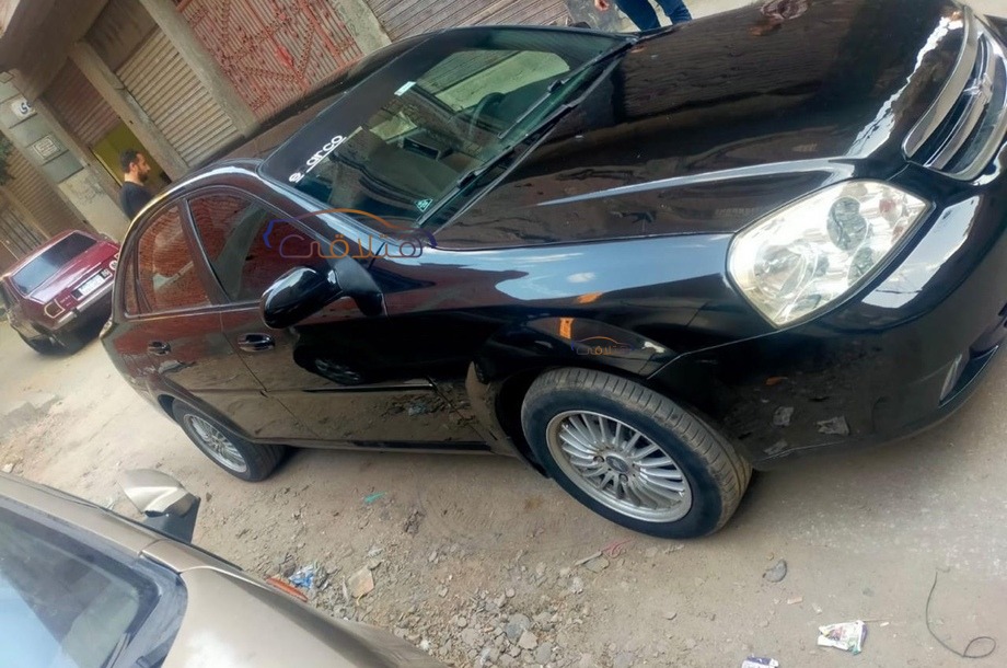 Optra Chevrolet أسود