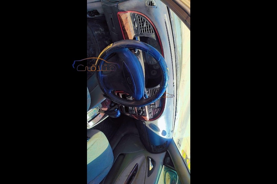 Nubira 2 Daewoo ذهبي