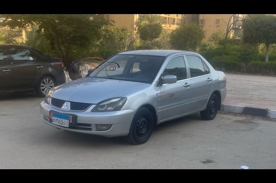 Lancer Puma Mitsubishi فضي