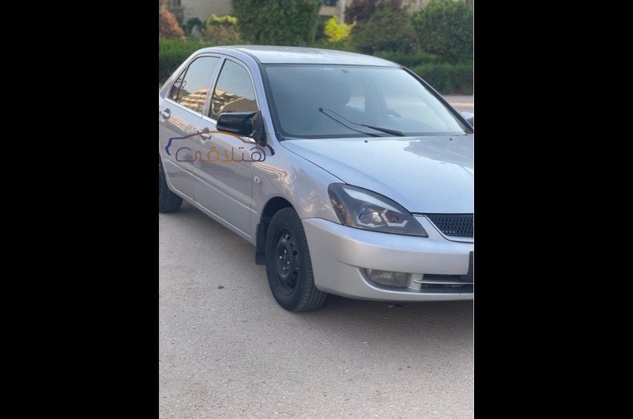 Lancer Puma Mitsubishi فضي