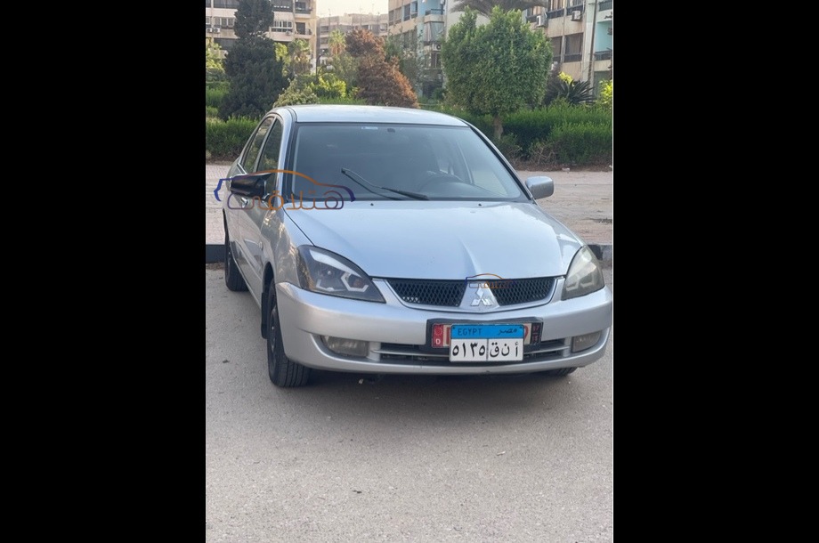 Lancer Puma Mitsubishi فضي