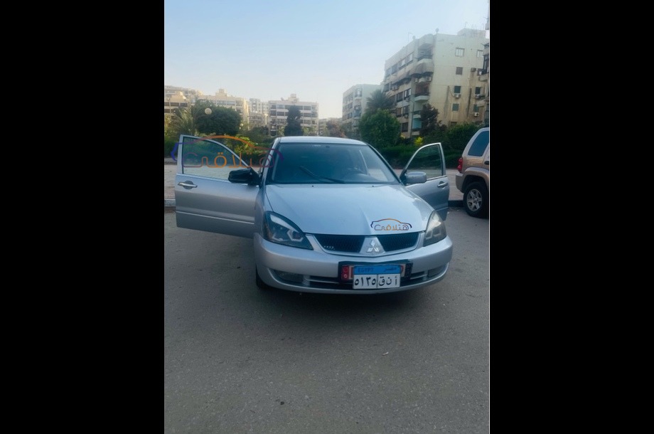 Lancer Puma Mitsubishi فضي