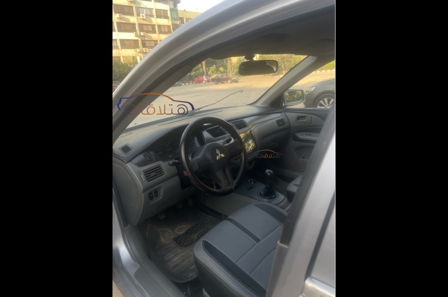 Lancer Puma Mitsubishi فضي