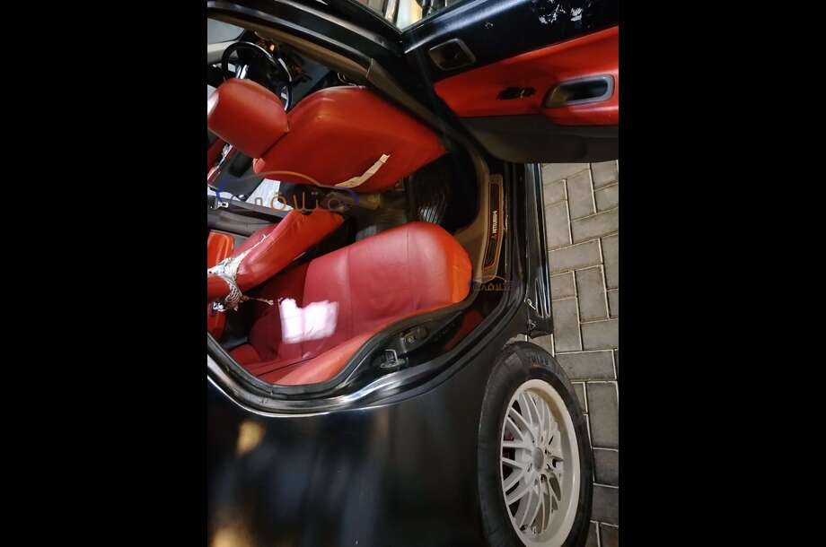 Lancer Puma Mitsubishi أسود