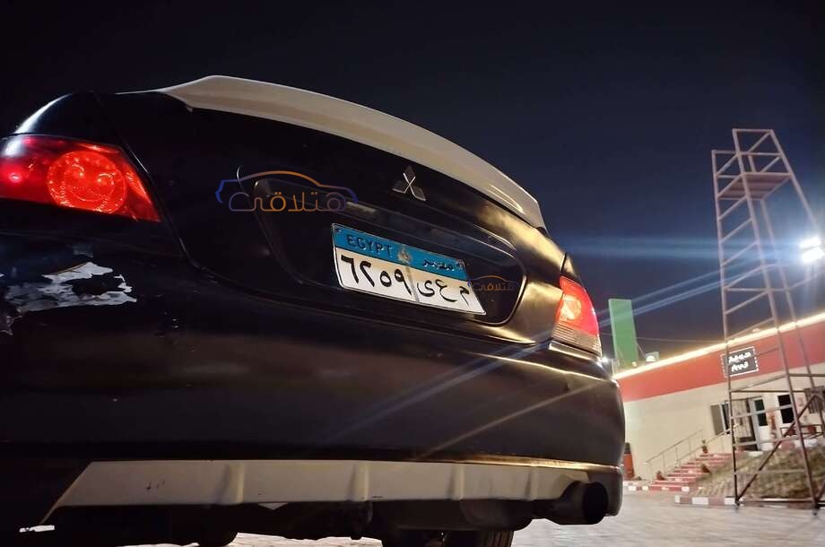 Lancer Puma Mitsubishi أسود