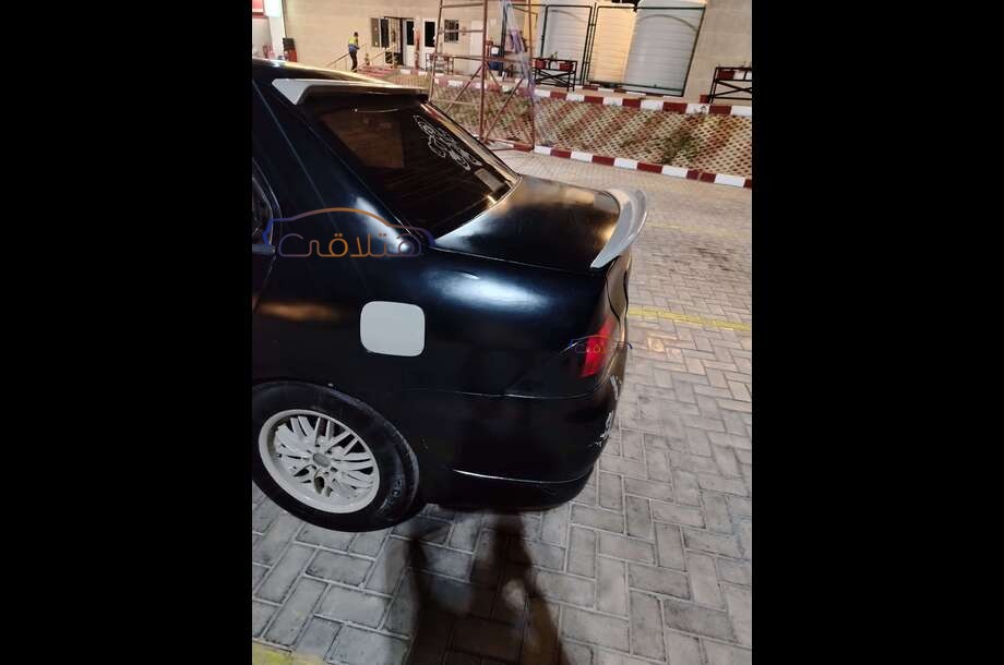 Lancer Puma Mitsubishi أسود