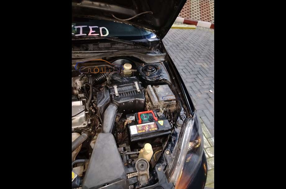 Lancer Puma Mitsubishi أسود