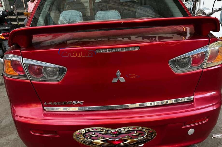 Lancer EX Shark Mitsubishi احمر