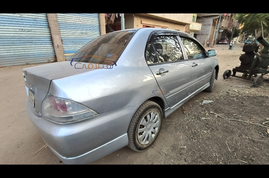 Lancer Puma Mitsubishi فضي