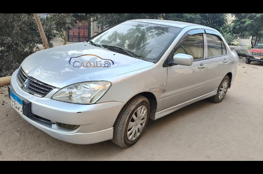 Lancer Puma Mitsubishi فضي