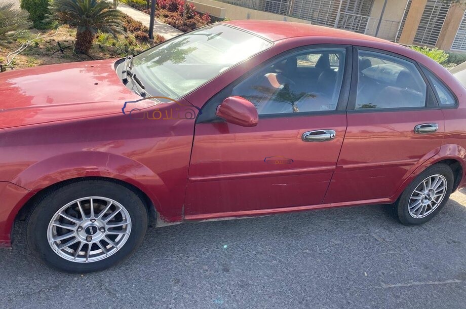 Optra Chevrolet احمر