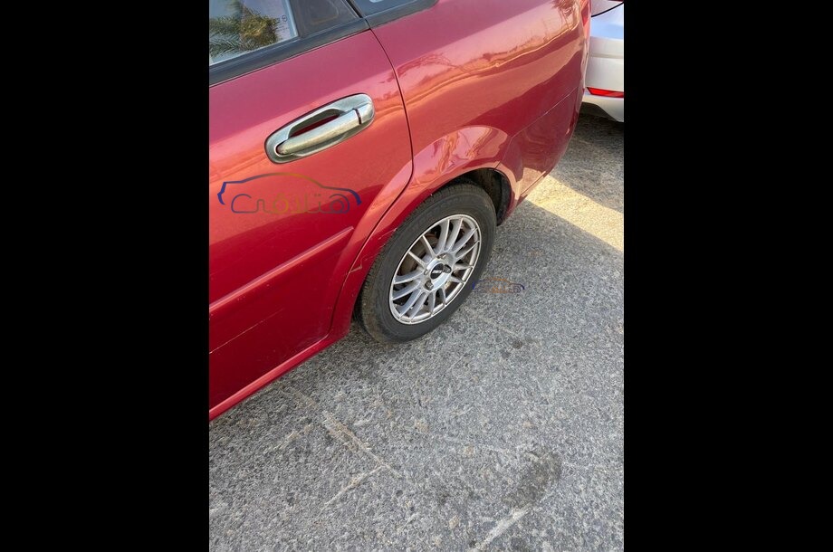 Optra Chevrolet احمر