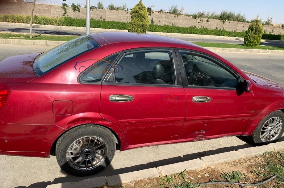 Optra Chevrolet احمر