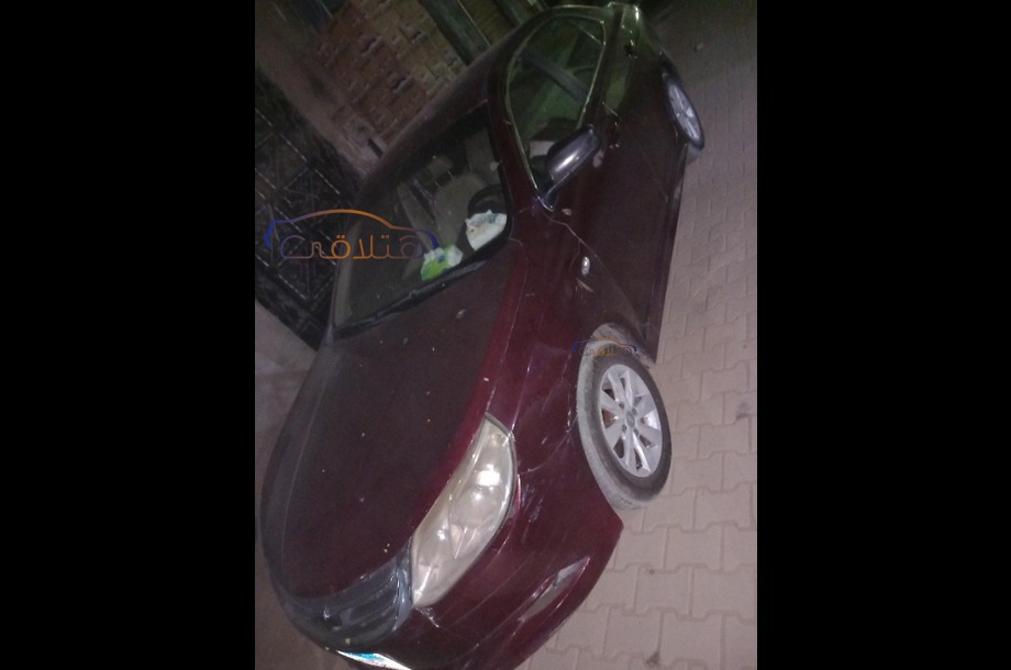 Optra Chevrolet Dark red