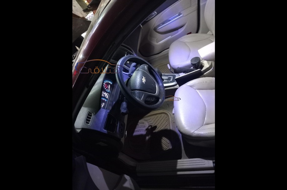 Optra Chevrolet Dark red