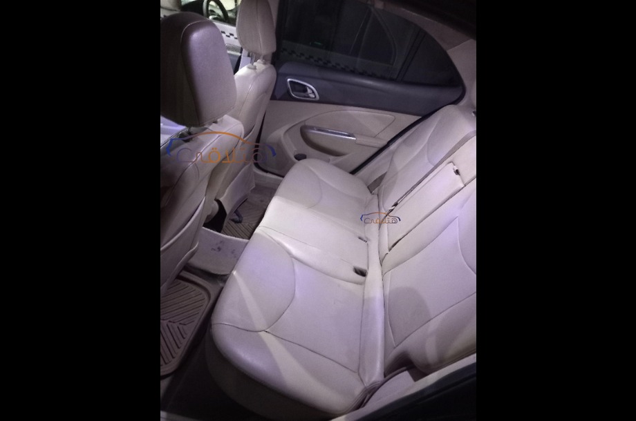 Optra Chevrolet Dark red