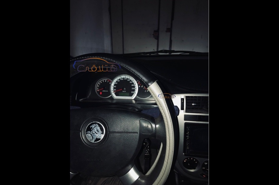 Optra Chevrolet فضي