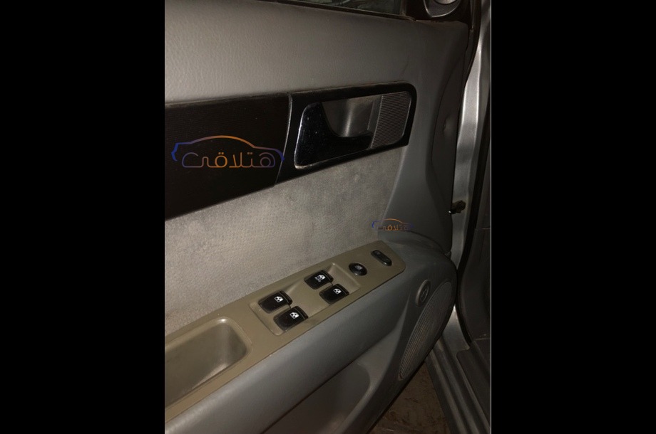 Optra Chevrolet فضي