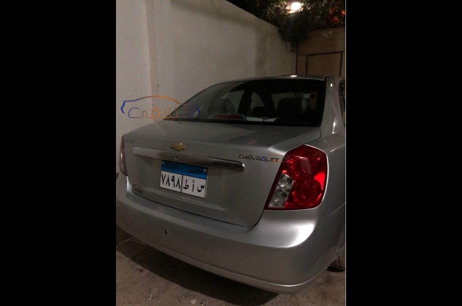 Optra Chevrolet فضي