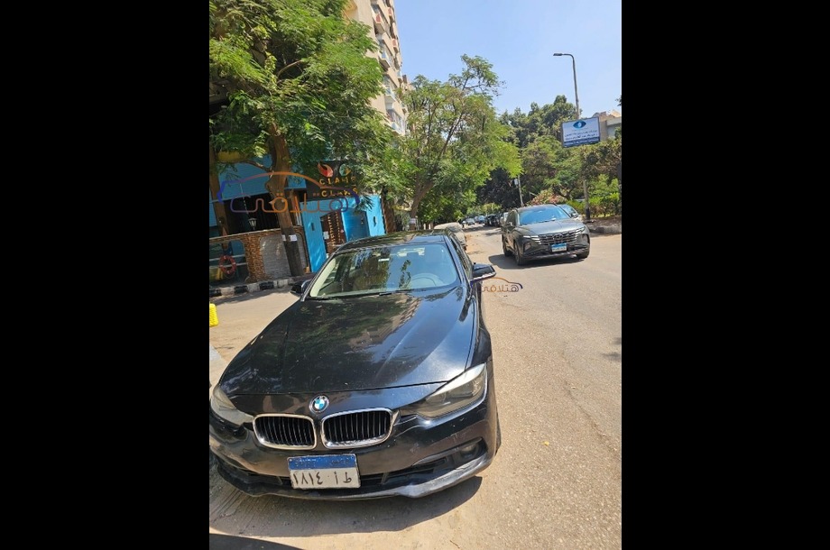320 BMW أسود