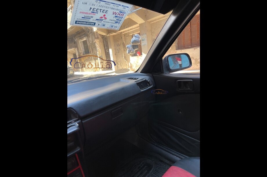 Lancer Mitsubishi احمر غامق