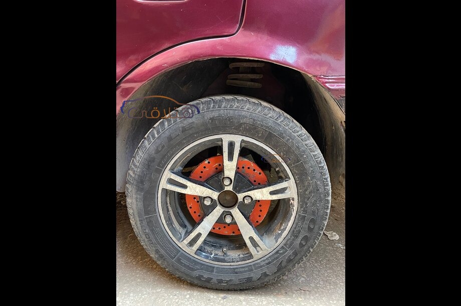 Lancer Mitsubishi احمر غامق