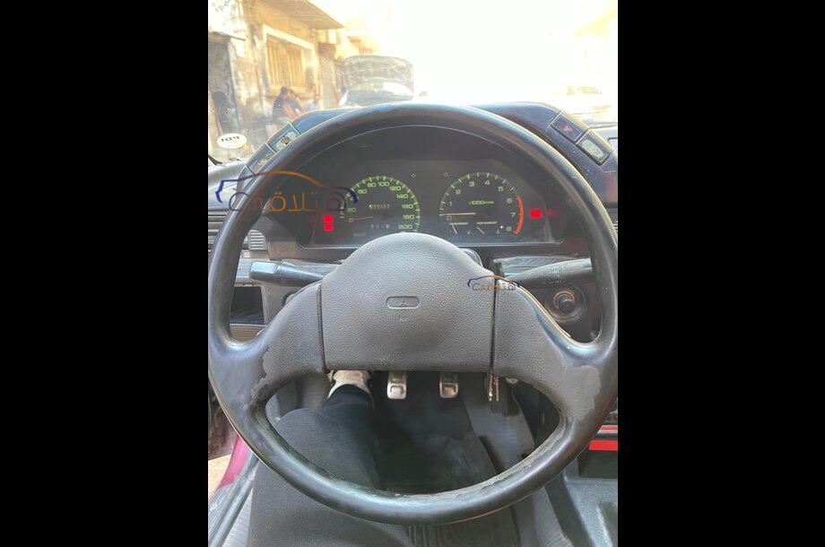 Lancer Mitsubishi احمر غامق