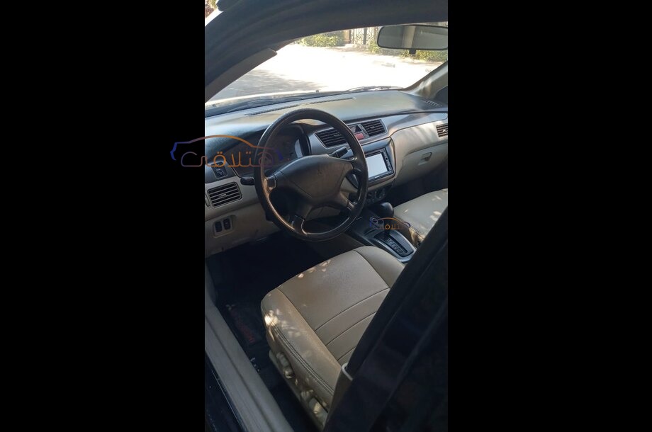 Lancer Puma Mitsubishi أسود