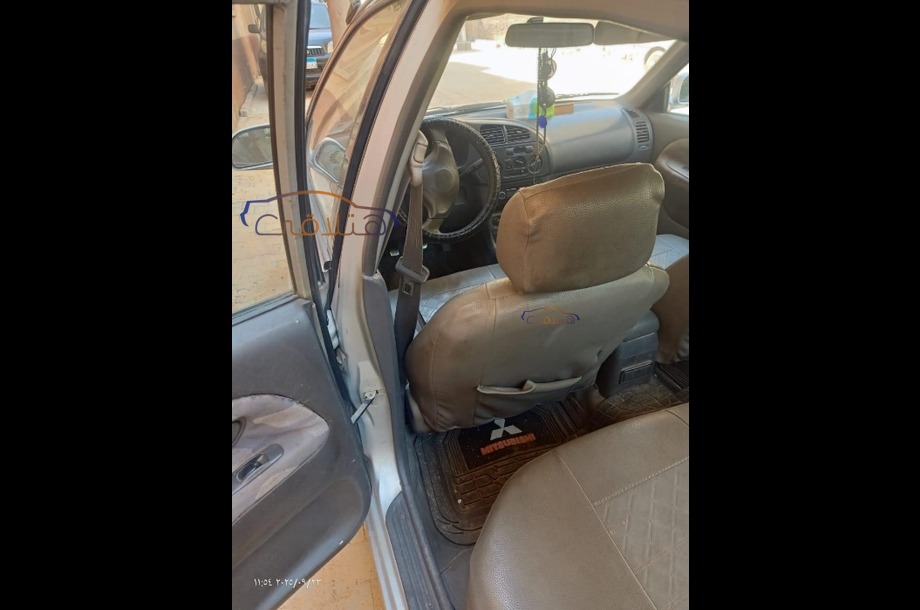 Lancer Crystala Mitsubishi فضي