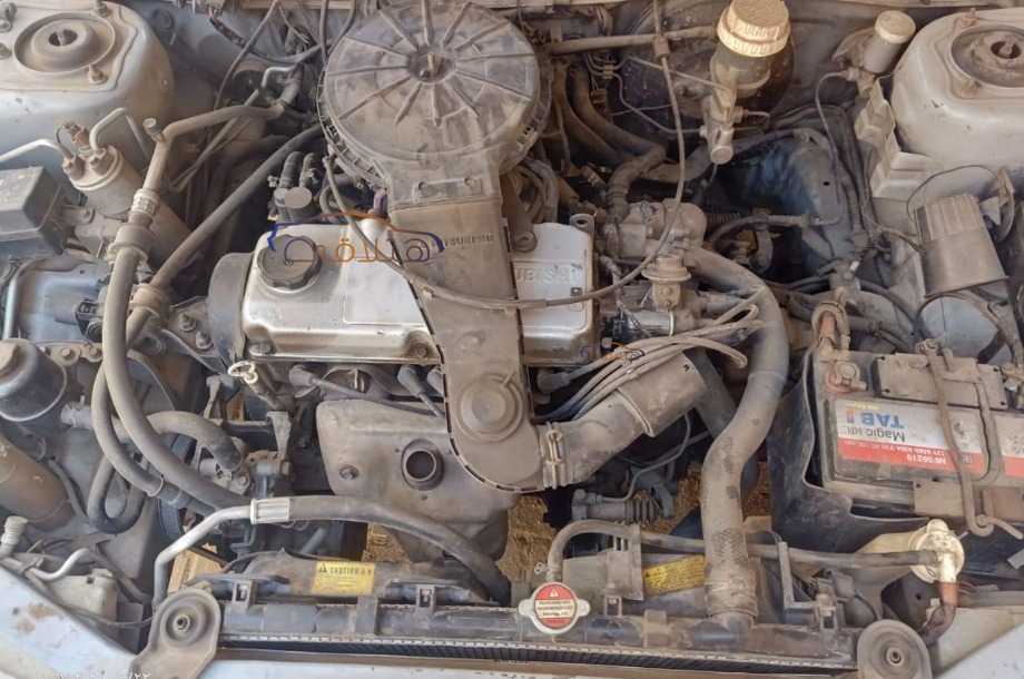 Lancer Crystala Mitsubishi فضي