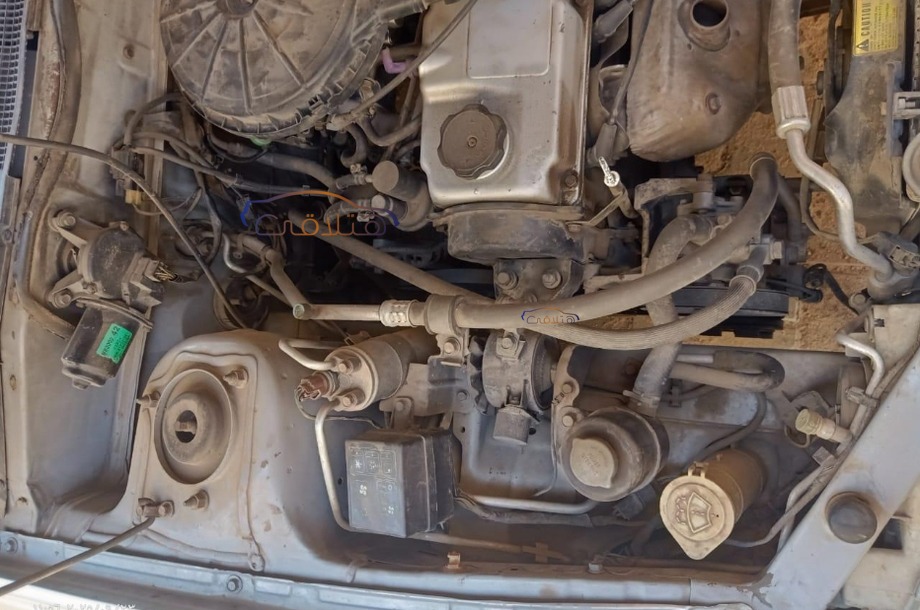 Lancer Crystala Mitsubishi فضي