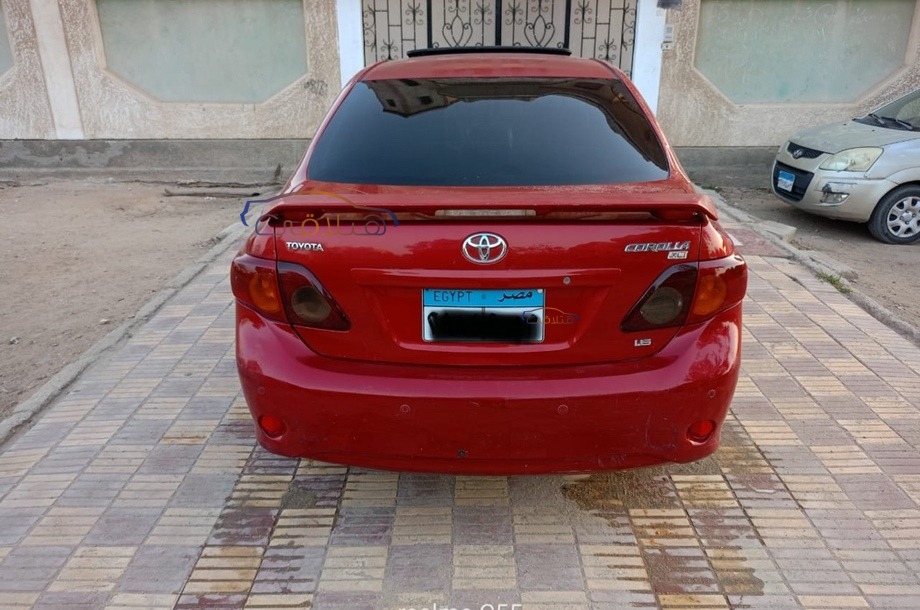 Corolla Toyota احمر غامق