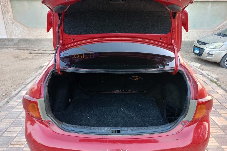 Corolla Toyota احمر غامق