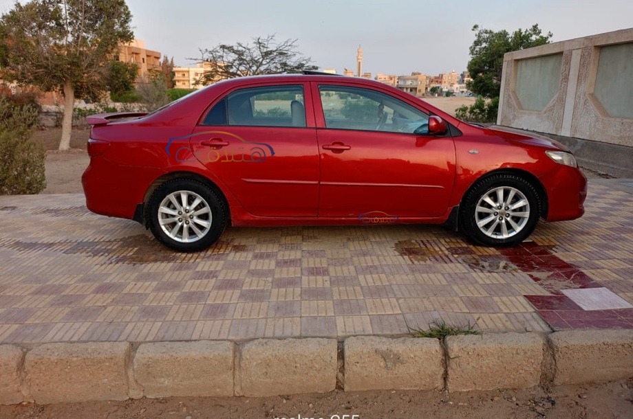 Corolla Toyota احمر غامق