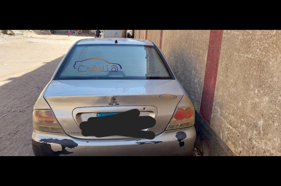 Lancer Puma Mitsubishi فضي