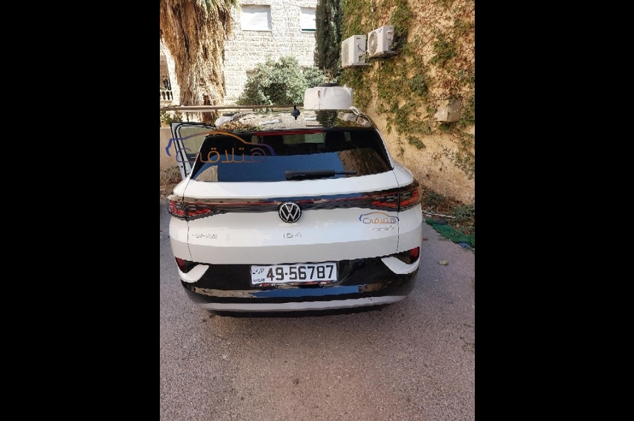 ID 4 Volkswagen أبيض