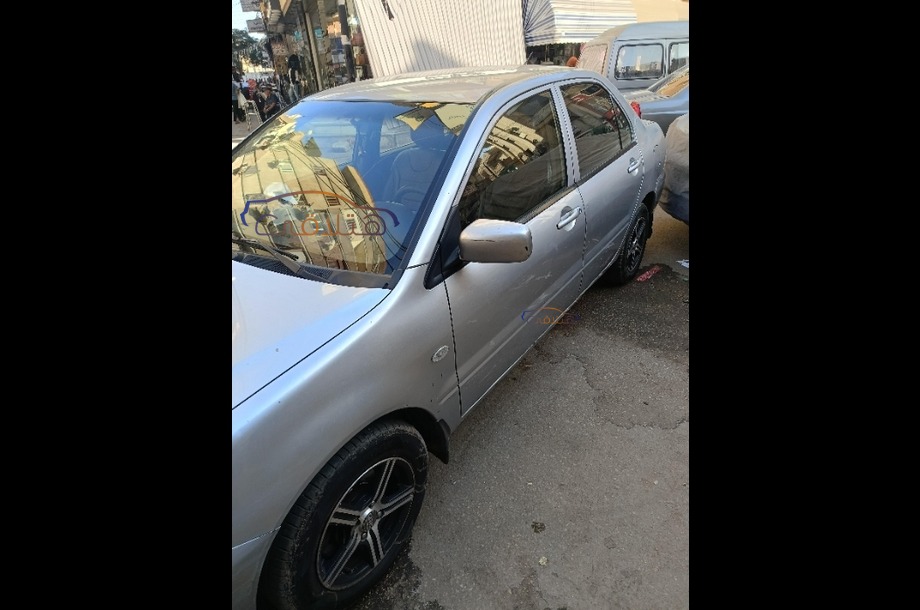 Lancer Puma Mitsubishi فضي