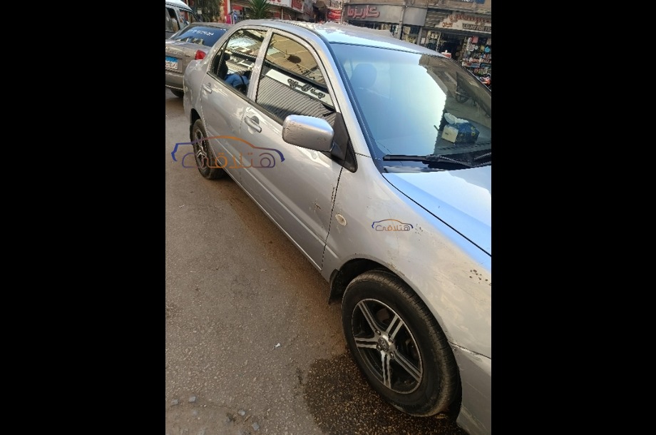 Lancer Puma Mitsubishi فضي