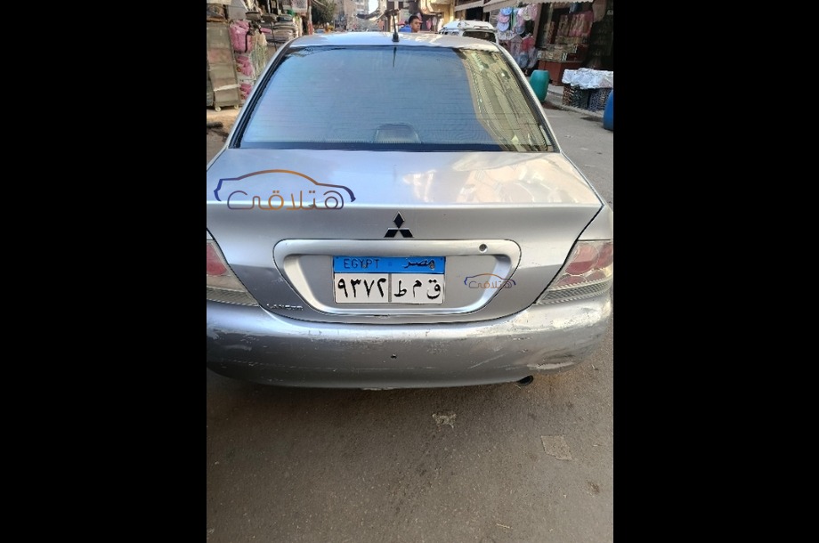 Lancer Puma Mitsubishi فضي