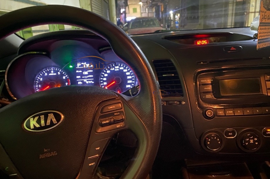 Cerato Kia احمر غامق