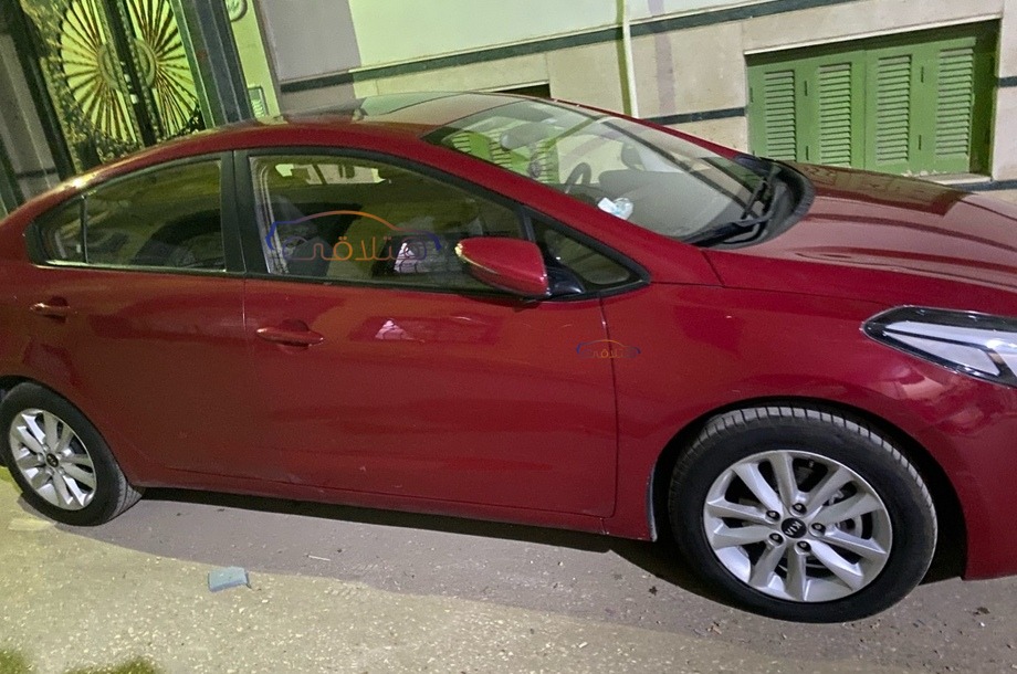 Cerato Kia احمر غامق
