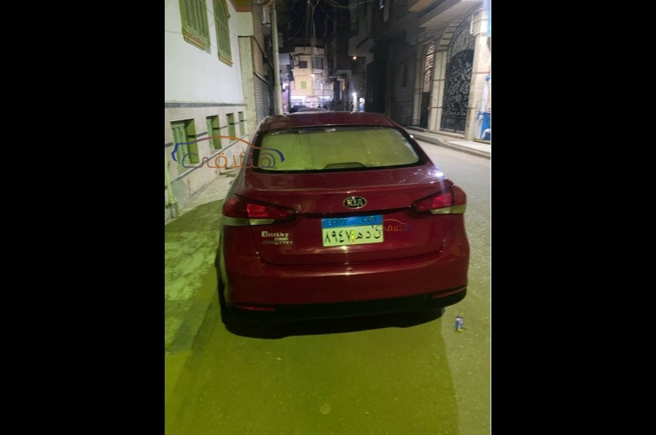 Cerato Kia احمر غامق