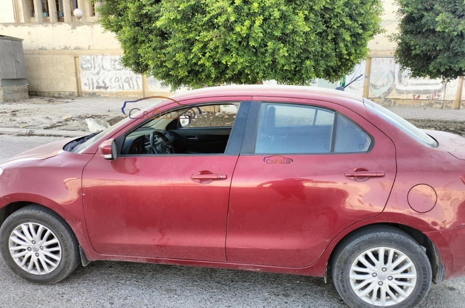 Dzire Suzuki Dark red