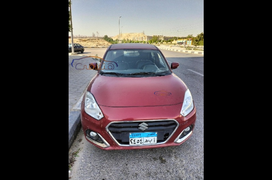 Dzire Suzuki Dark red