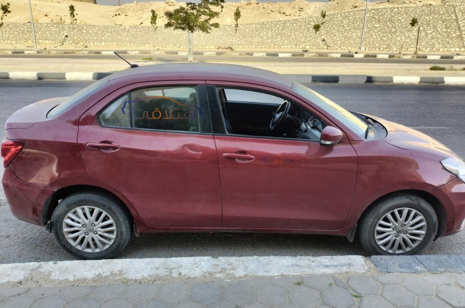 Dzire Suzuki Dark red