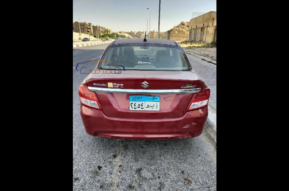 Dzire Suzuki Dark red