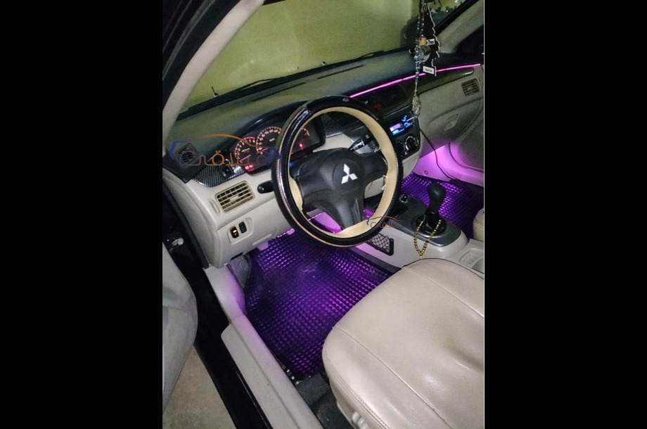 Lancer Puma Mitsubishi أسود