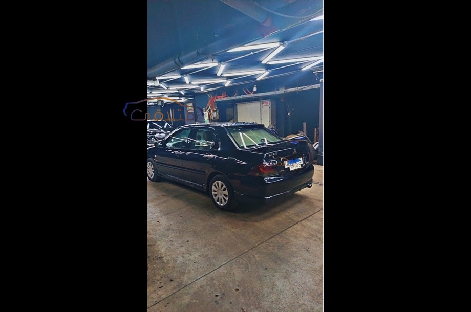 Lancer Puma Mitsubishi أسود