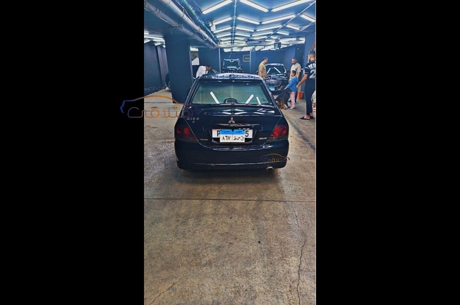 Lancer Puma Mitsubishi أسود