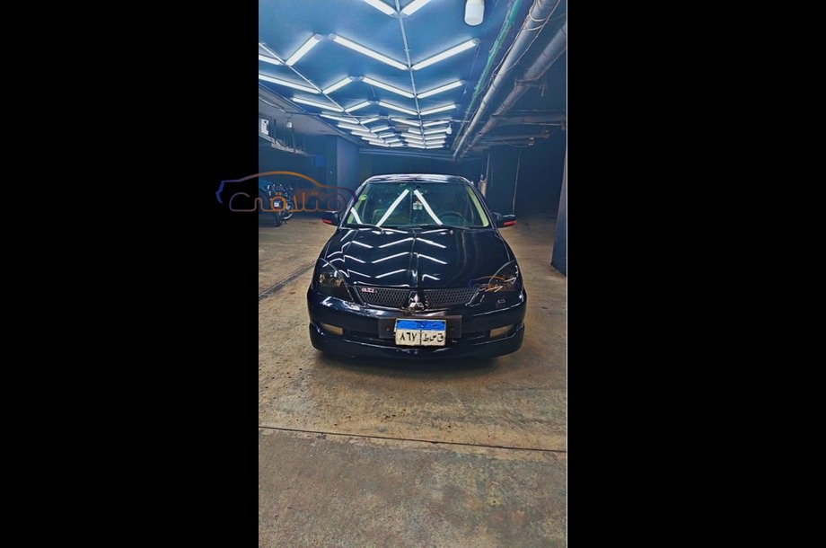 Lancer Puma Mitsubishi أسود